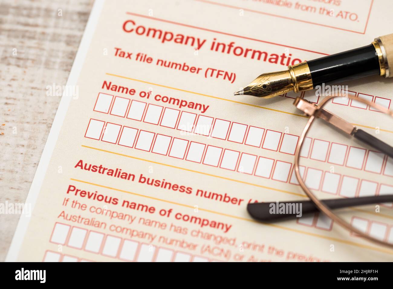 Australian tax declaration and pen on wooden table Stock Photo