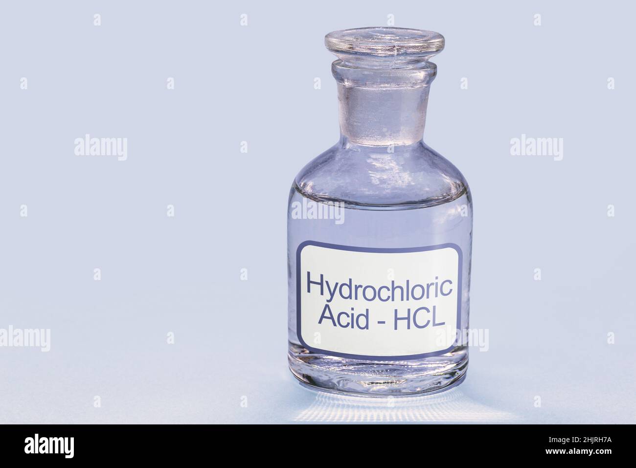 bottle of hydrochloric acid, a chemical solution used in cleaning and galvanizing metals, in tanning leather and obtaining various products Stock Photo