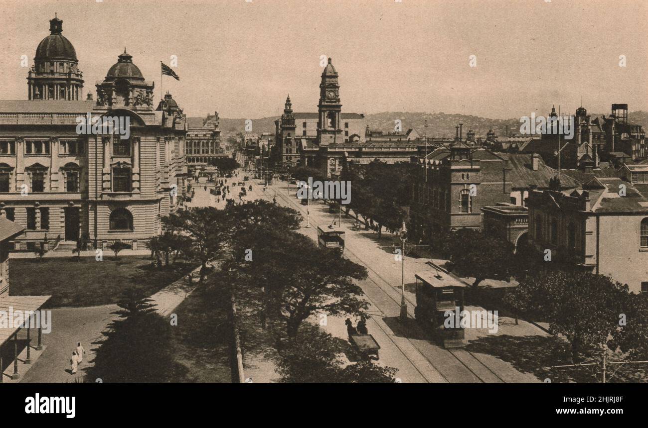 West Street, Durban. The townhall, the Post Office clocktower & beyond the hills of Berea