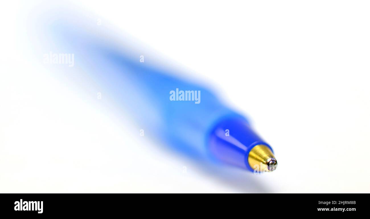Closeup of blue ball point pen for business or education blurry blured Stock Photo