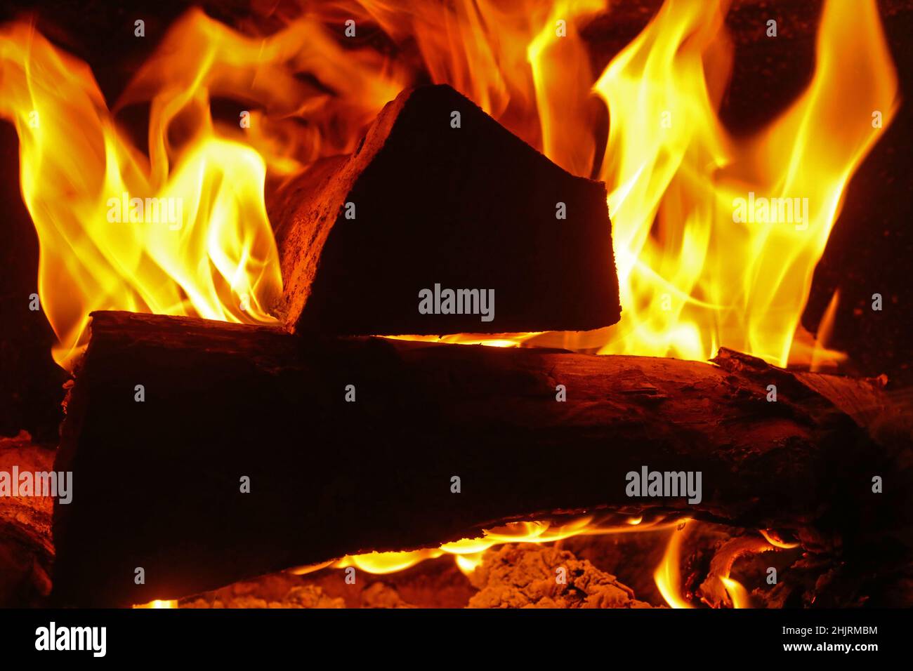 Burning wood in a wood stove in a home Stock Photo Alamy