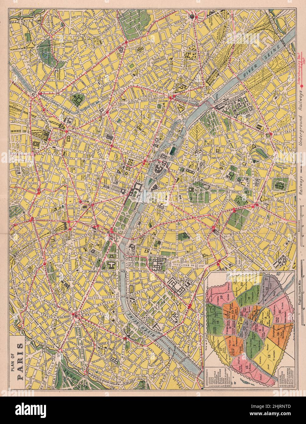 Central district of the ' City of Light. ' With its streets and railways and a plan of the arrondissements. Paris  (1923 map) Stock Photo