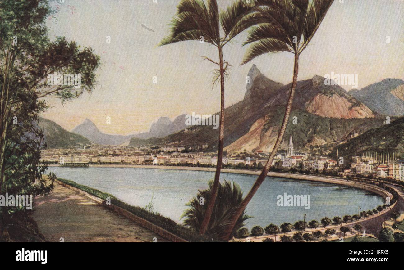 The Avenida Beira Mar makes a superb sweep round Botafogo Bay. On the left across the bay is the regatta pavilion. Rio de Janeiro (1923) Stock Photo