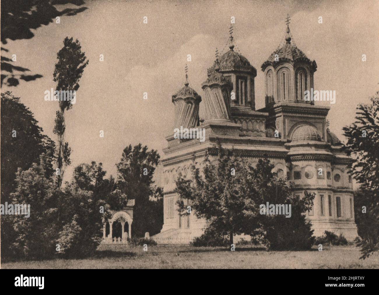 According to a legend the beautiful wife of the master builder of this cathedral at Curtea de Argesh was immured in the walls alive. Romania (1923) Stock Photo
