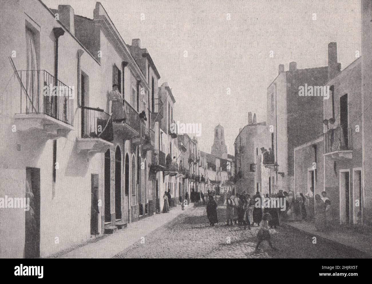 Islanders of San Pietro in a street of Carloforte. Italy. Sardinia (1923) Stock Photo
