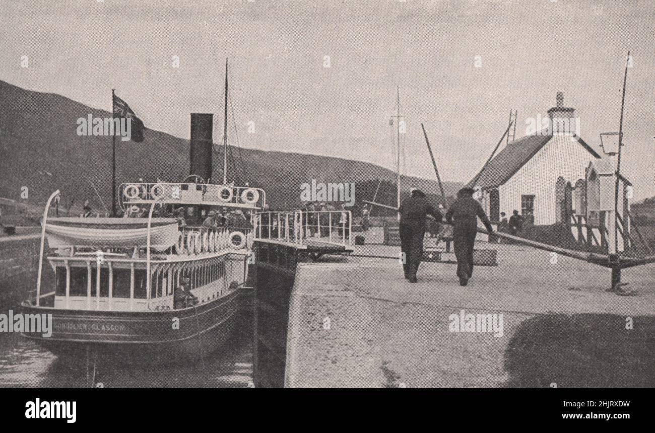 Passing through a lock of the Caledonian Canal. Scotland (1923) Stock Photo