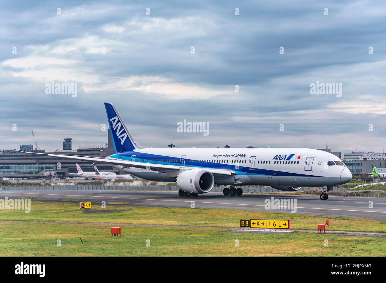 tokyo, japan - december 06 2021: Airbus or Boeing plane from Japanese national carrier airline All Nippon Airways alias ANA moving forward on the apro Stock Photo