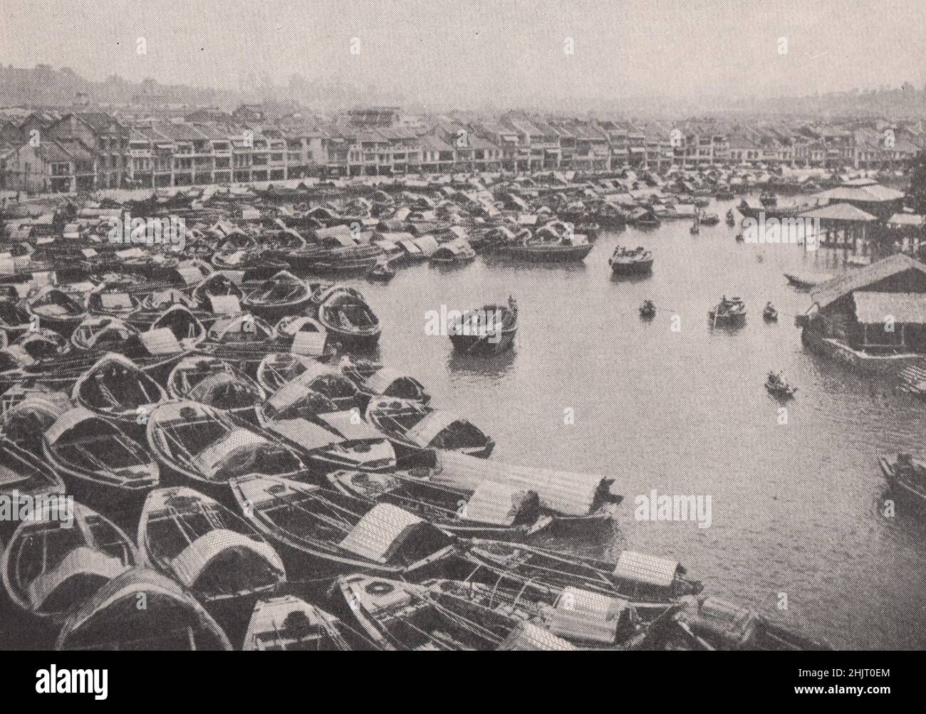 Crescent curve of Singapore's picturesque boat quay (1923) Stock Photo