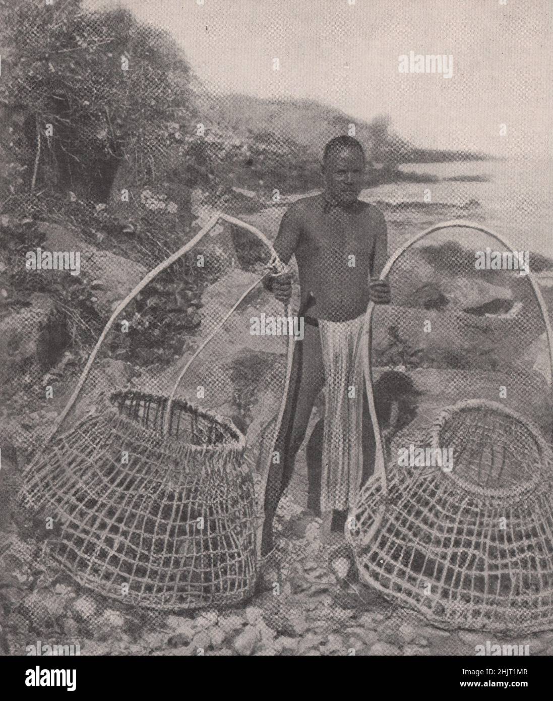 Native of Tanna Island, New Hebrides, with his fish traps. Vanuatu. South Pacific Islands (1923) Stock Photo
