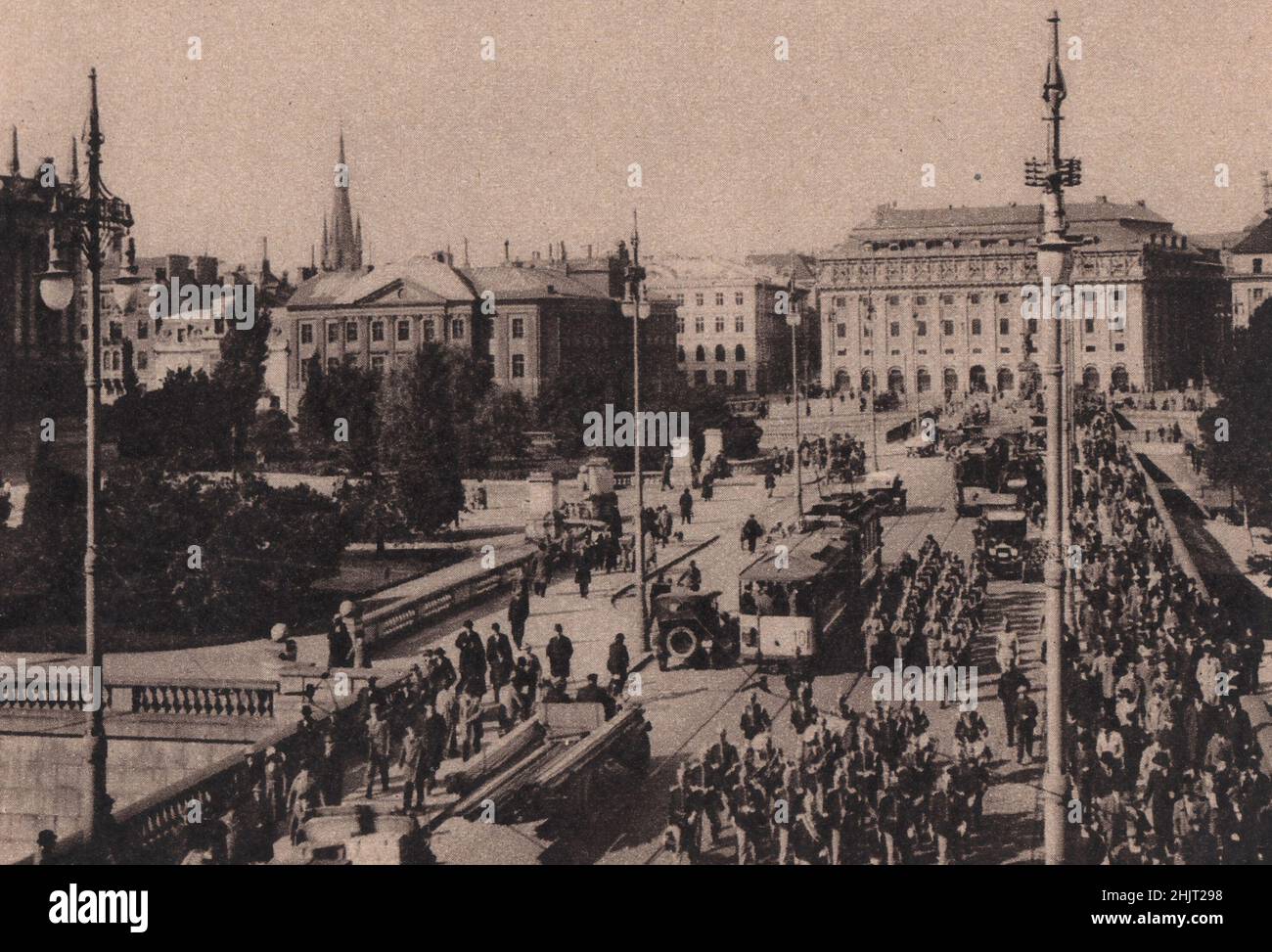 The Norrbro, or North Bridge, is the centre of the city and over it march the guards to be mounted at the royal palace. Sweden. Stockholm (1923) Stock Photo