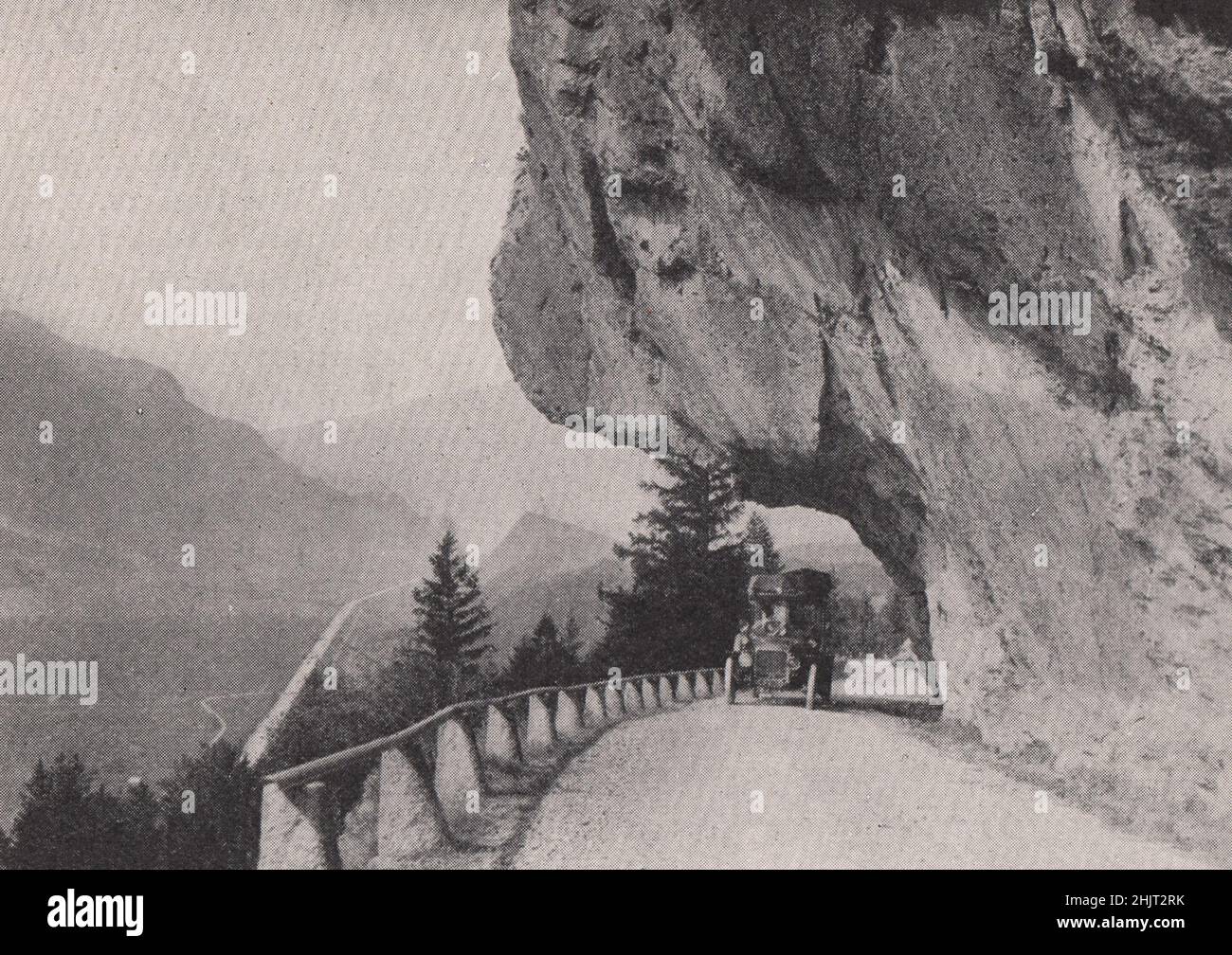 Where a railing marks a precipice on the Brunig pass. Switzerland (1923) Stock Photo