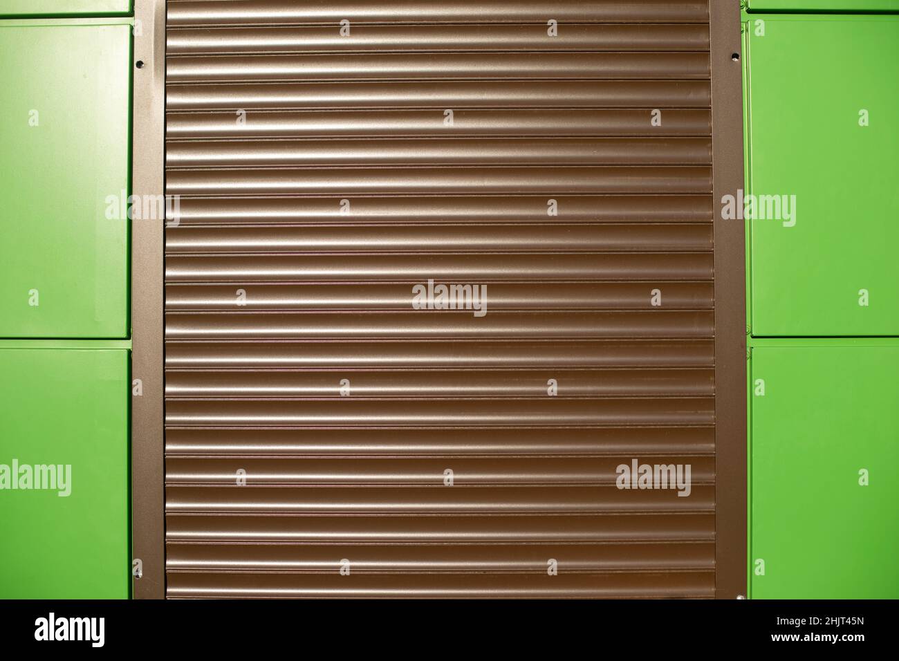 Protective door. Entrance to building. Door lock. Facade of building