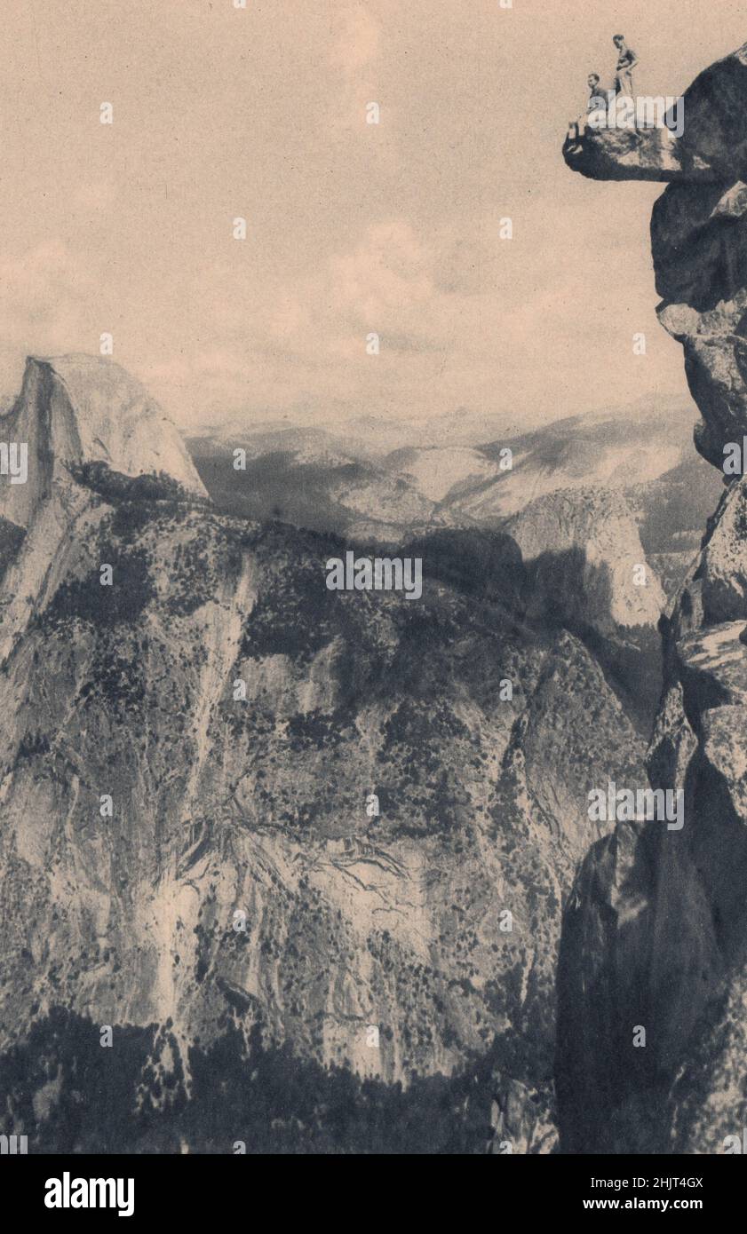 Noblest of Yosemite's rocks is the Half Dome, 4,740 feet. It is seen here across the valley from Overhanging Rock. California. United States (1923) Stock Photo