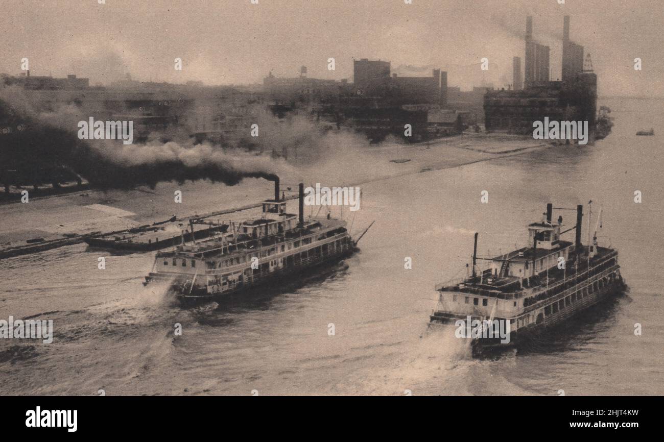 St Louis, on the west bank of the Mississipi, is the chief city of Missouri, A stern-wheel paddle-boat has been evolved for its navigation (1923) Stock Photo