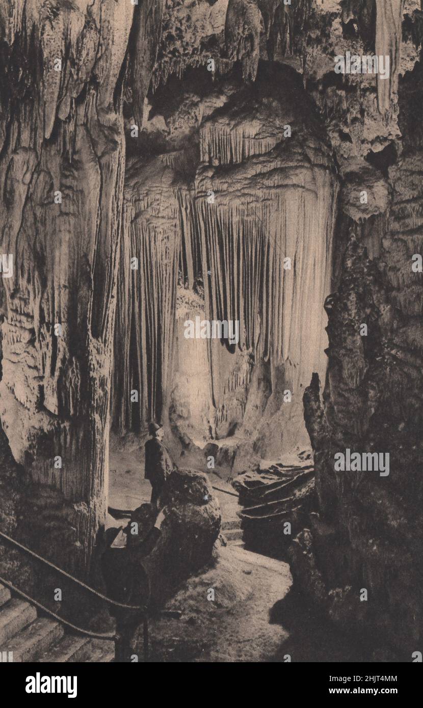These beautiful stalactite formations in the marvellous cave at Luray in Virginia are illuminated by electricity. United States (1923) Stock Photo