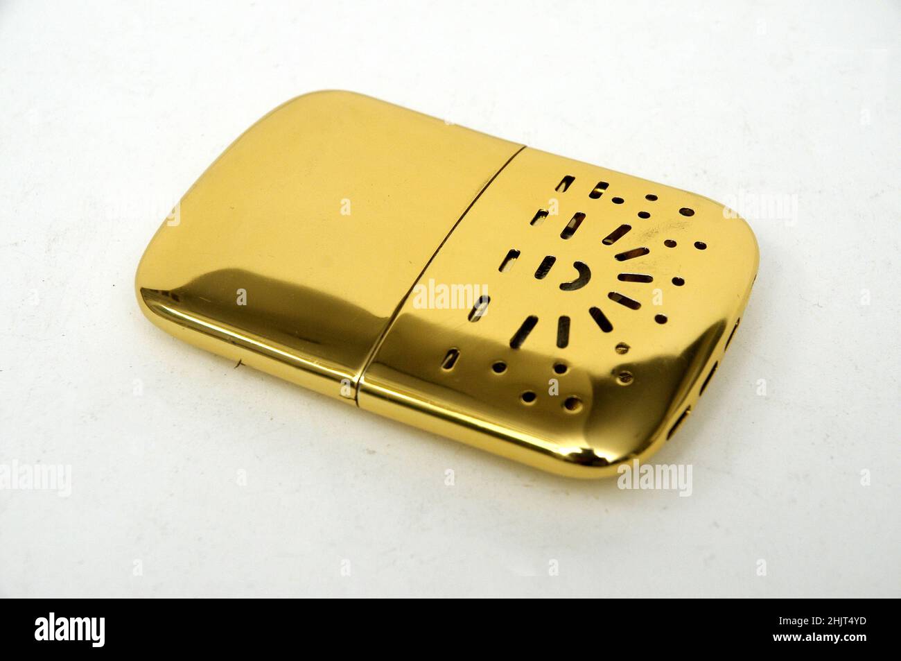 vintage object, pocket warmer Stock Photo Alamy