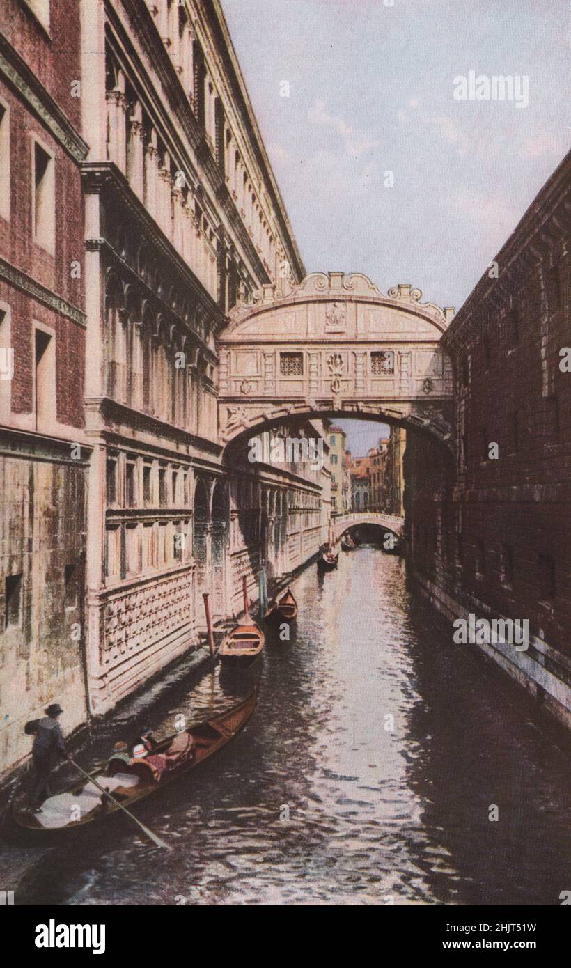 The so-called 'Bridge of Sighs,' completed in 1605, connects the old criminal courts in the Doges' Palace with the prison. Venice (1923) Stock Photo