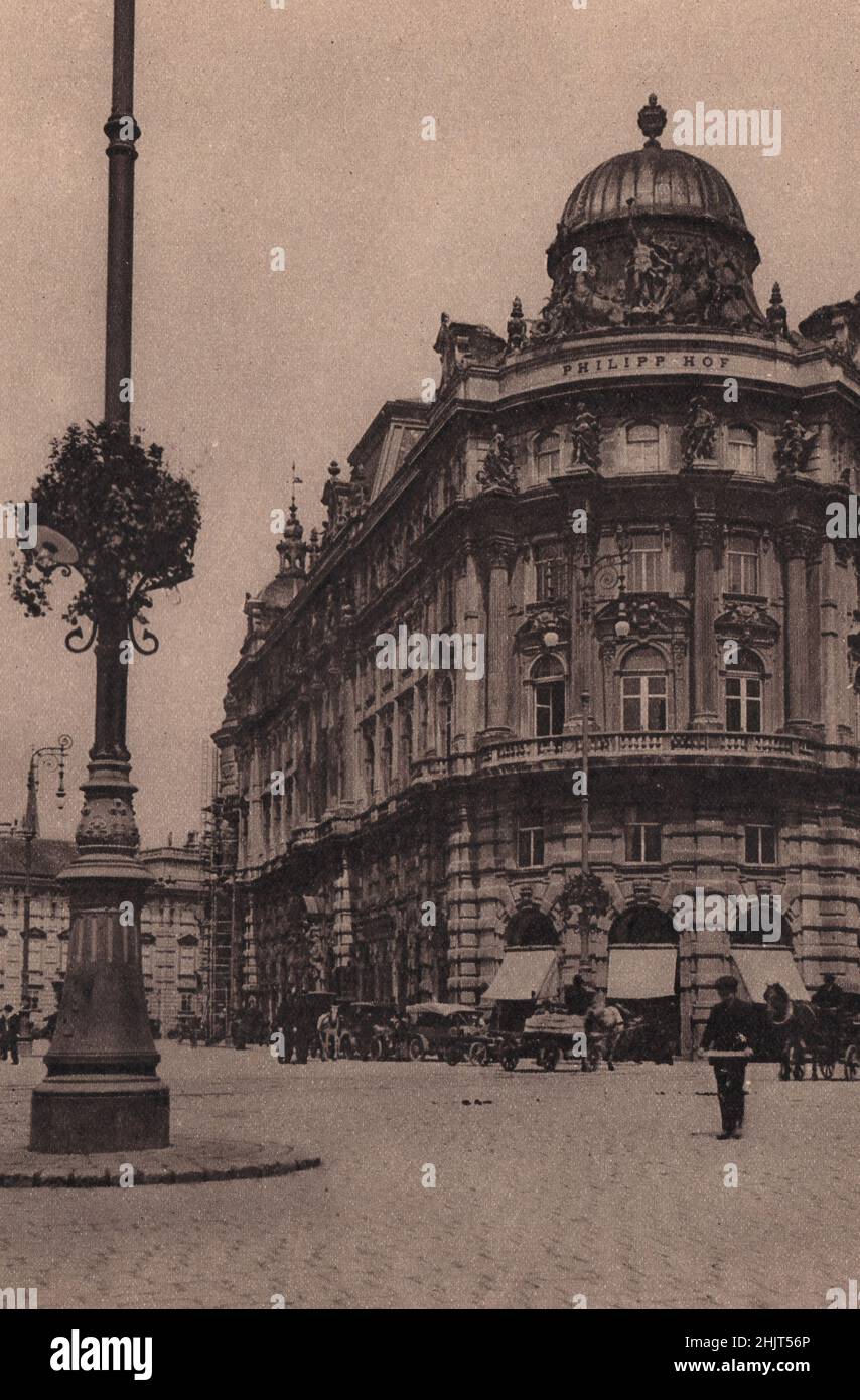 At the back of the Opera House is Albrechtsplatz. Notice that the lamp standard supports flowering plants in a box. Austria. Vienna (1923) Stock Photo