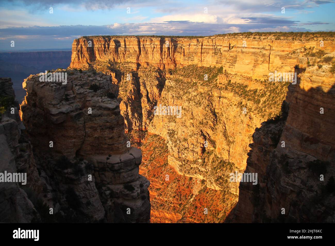 A stratification wall during a orange sunrise in the Grand Canyon National Park in Arizona Stock Photo