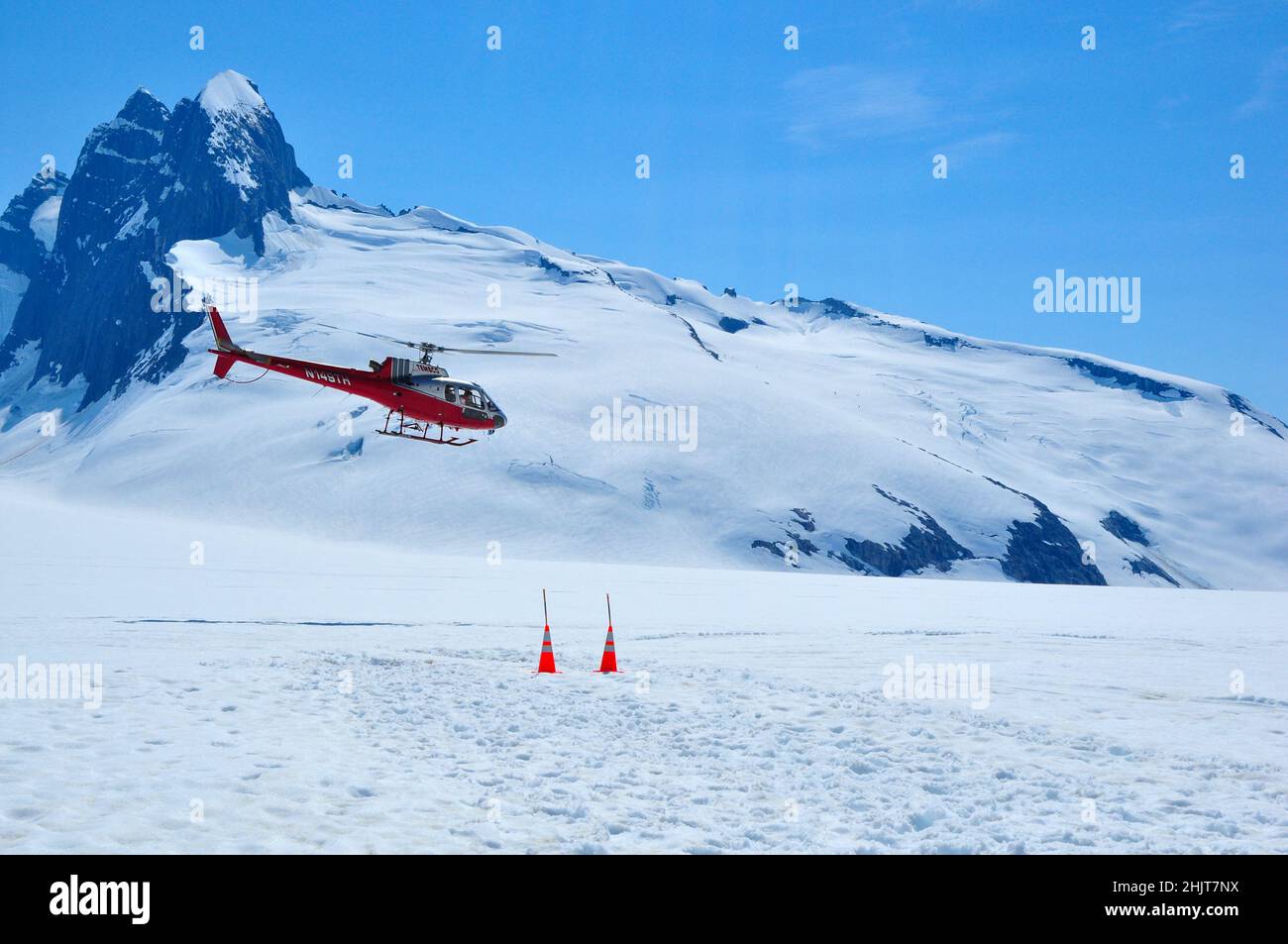Helicopters on top of Mendenhall glacier in Juneau Ice field, Alaska Stock Photo