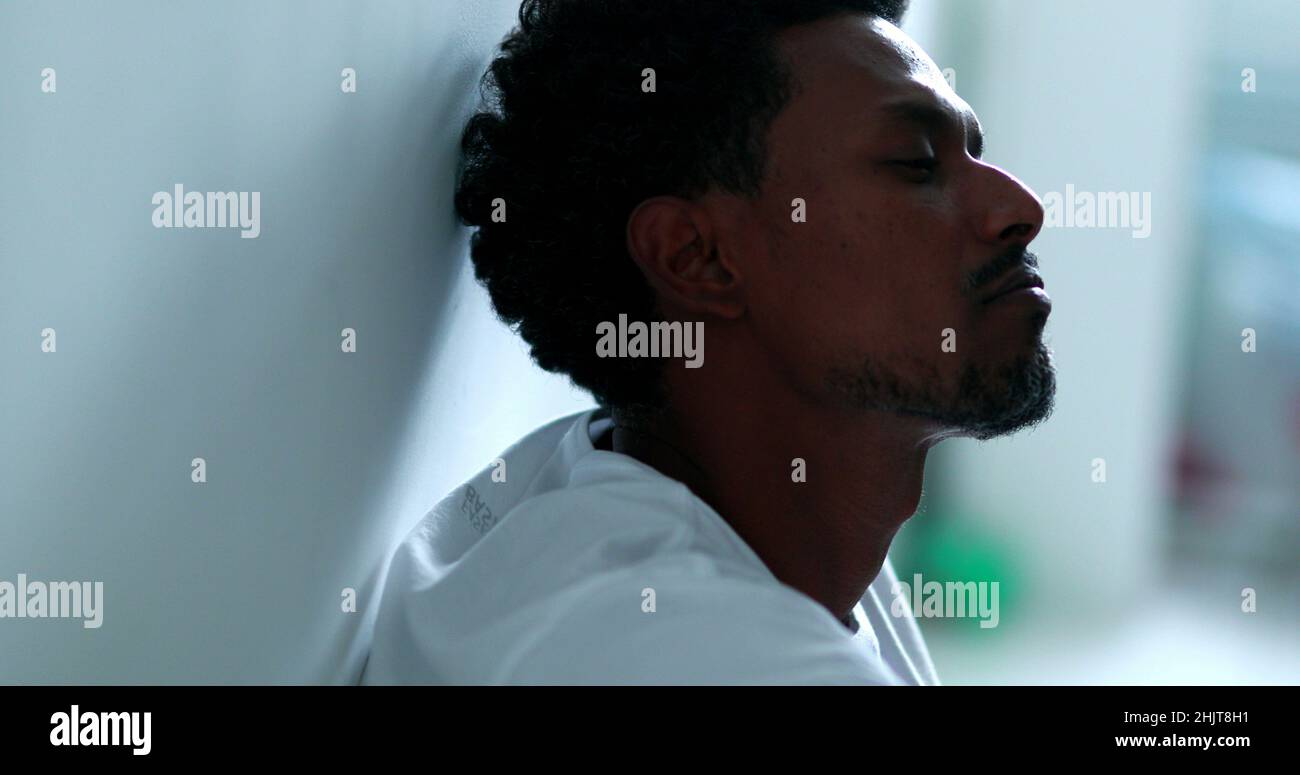 African man feeling emotional disorder feeling depressed Stock Photo ...