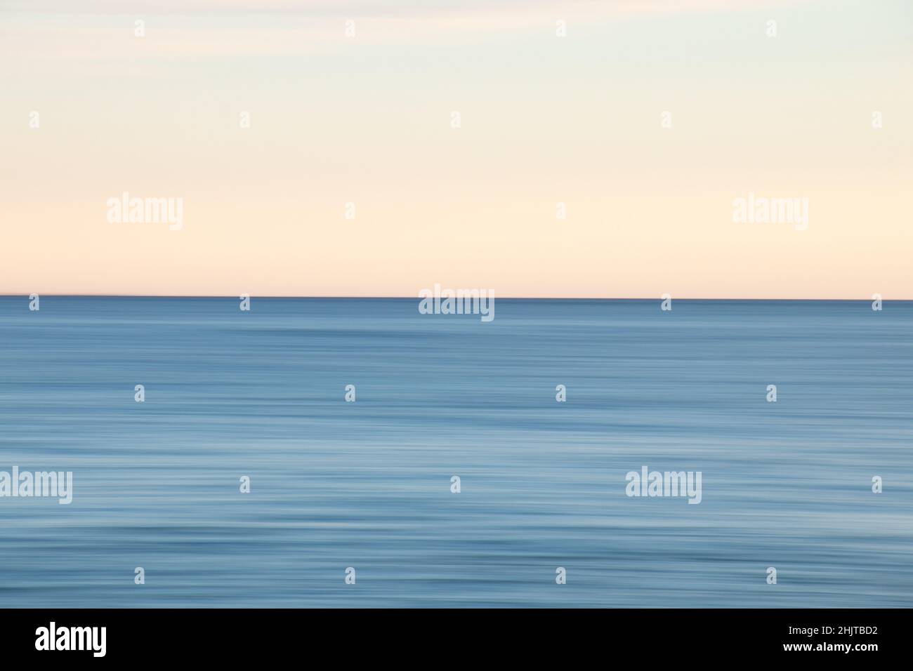 Beautiful photo of the sea at sunset and clear sky Stock Photo - Alamy