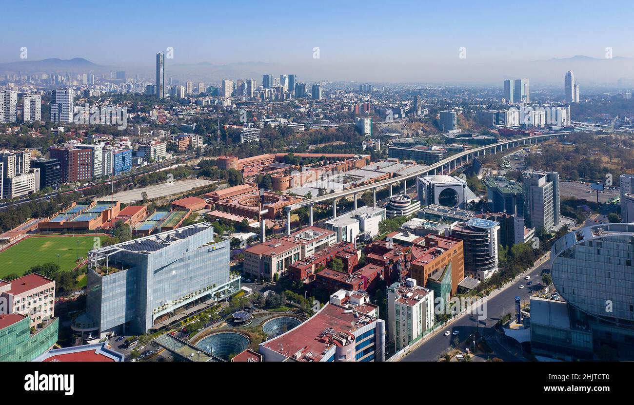 Santa Fe area of Mexico City, Mexico with smog layer in background Stock Photo