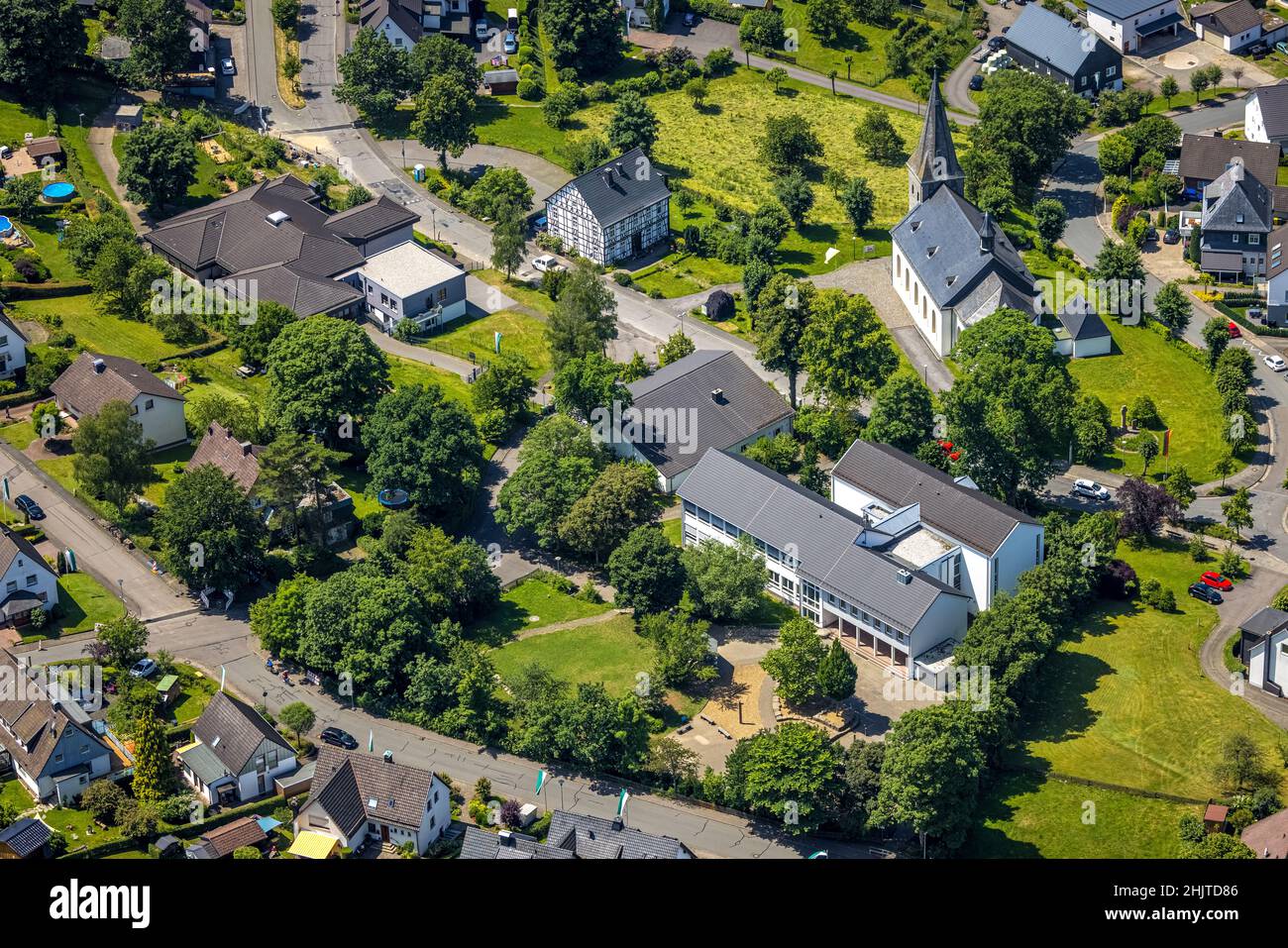 Aerial view, catholic primary school Franz-Hitze-Schule, church St. Cyriakus, Rhode, Olpe, Sauerland, North Rhine-Westphalia, Germany, place of worshi Stock Photo
