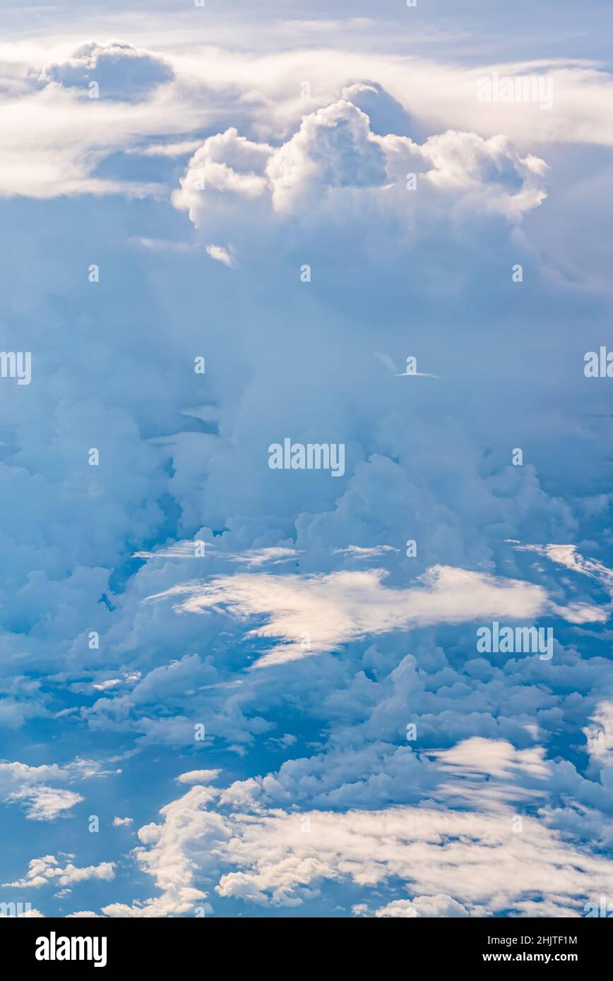 Aerial view over fluffy clouds hi-res stock photography and images - Alamy