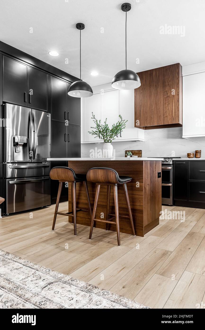 Midcentury modern kitchen and dining room interior design with black