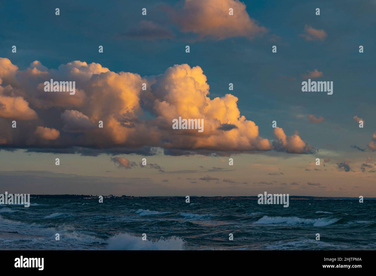 striking clouds in evening mood over the sea Stock Photo