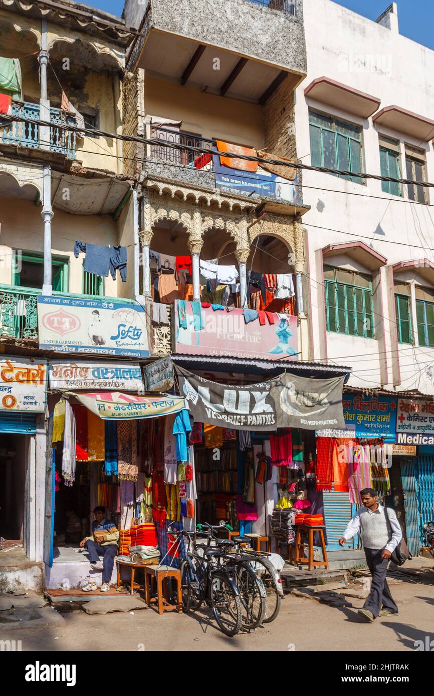 Roadside buildings with balconies on the outskirts of Varanasi (formerly Banaras or Benares), a city on the River Ganges in Uttar Pradesh, north India Stock Photo