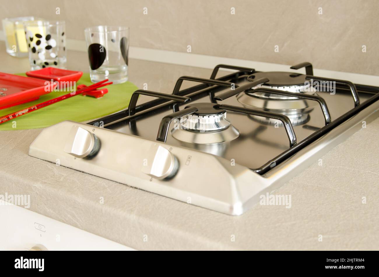 Twoburner gas cooker built into the countertop Stock Photo Alamy