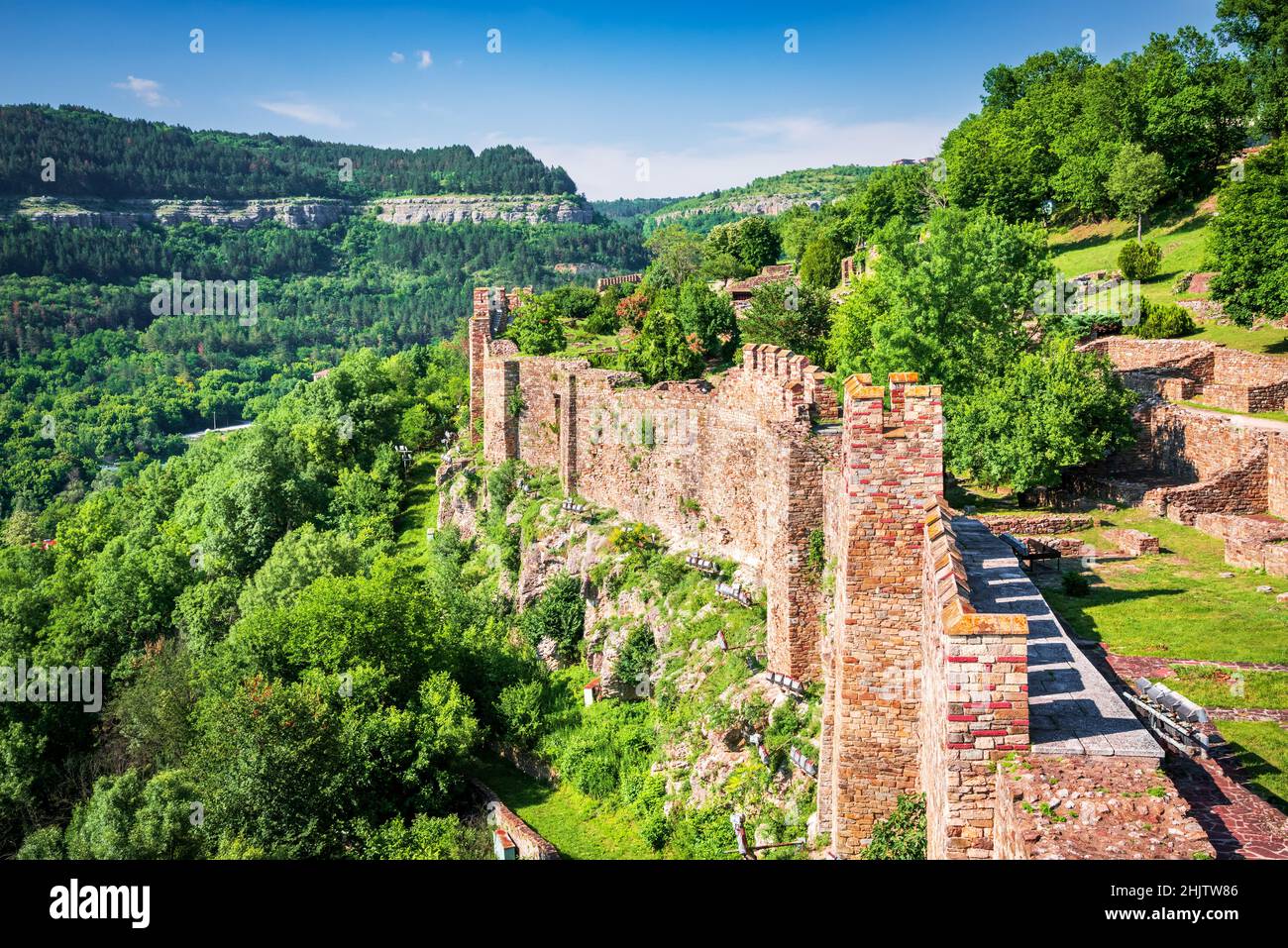 Veliko Tarnovo, Bulgaria. Tsarevets frotress medieval walls in historical city Veliko Tarnovo, former bulgarian capital, beautiful summer day. Stock Photo