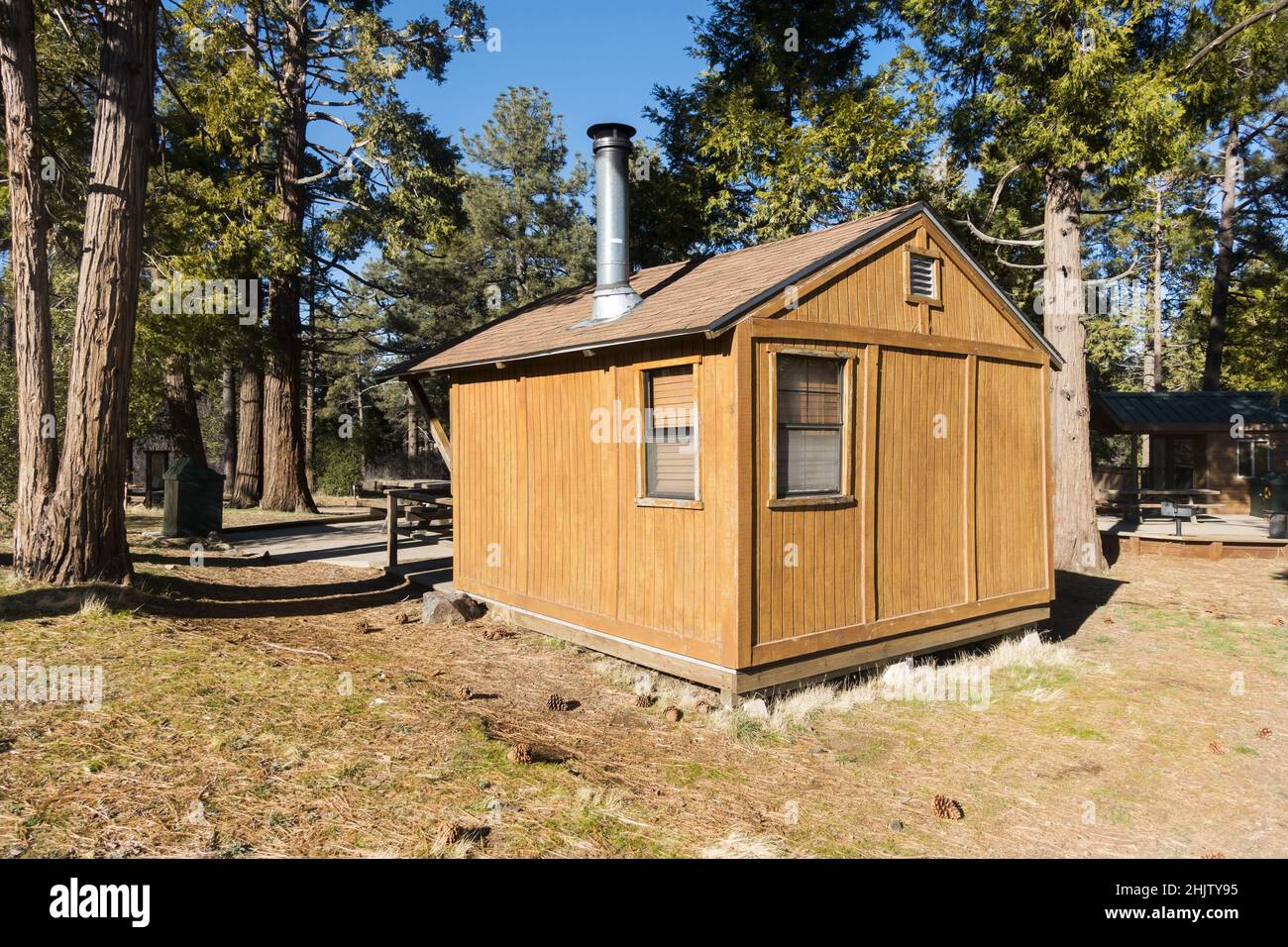 Primitive Wooden Log Cabin in Nature Forest Clearing. Cuyamaca Rancho California State Park Picnic Area Scenic Landscape Stock Photo