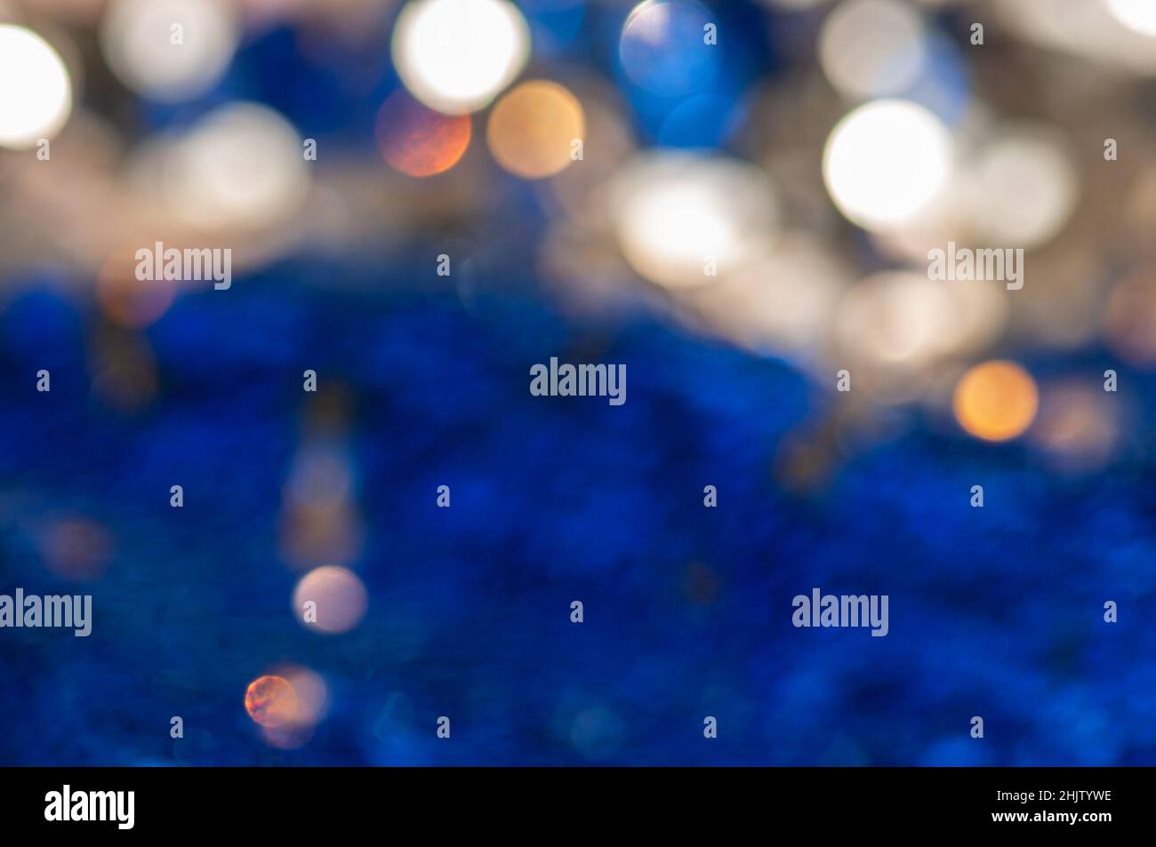Blue defocused abstract bokeh lights background. Stock Photo