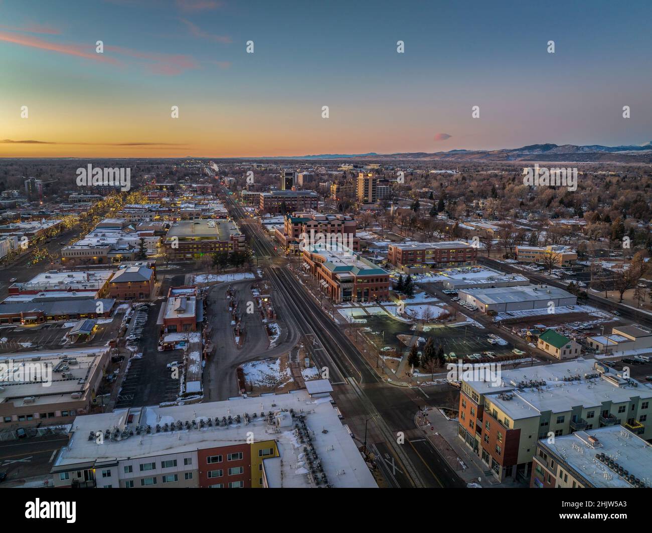 winter sunrise over Fort Collins, Colorado and Rocky Mountains aerial
