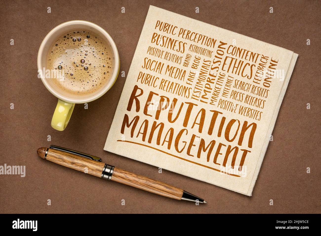 reputation management word cloud, handwriting on a napkin with a cup of coffee, business and public relations concept Stock Photo