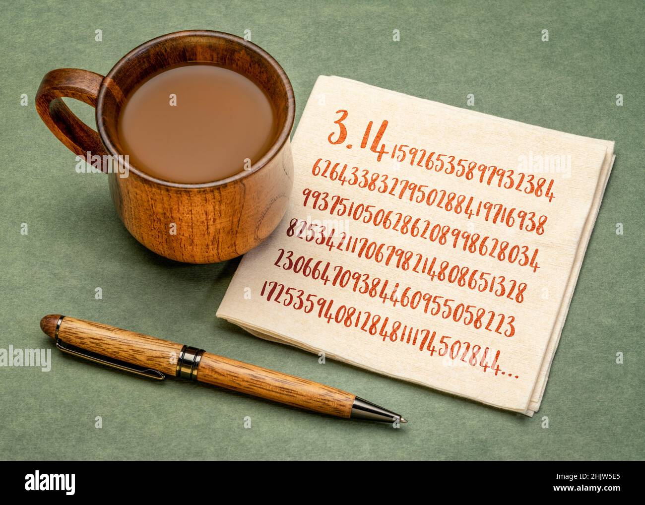 number pi 3.1415 with 140 decimal places - handwriting on a napkin with coffee, mathematics and pi day concept Stock Photo