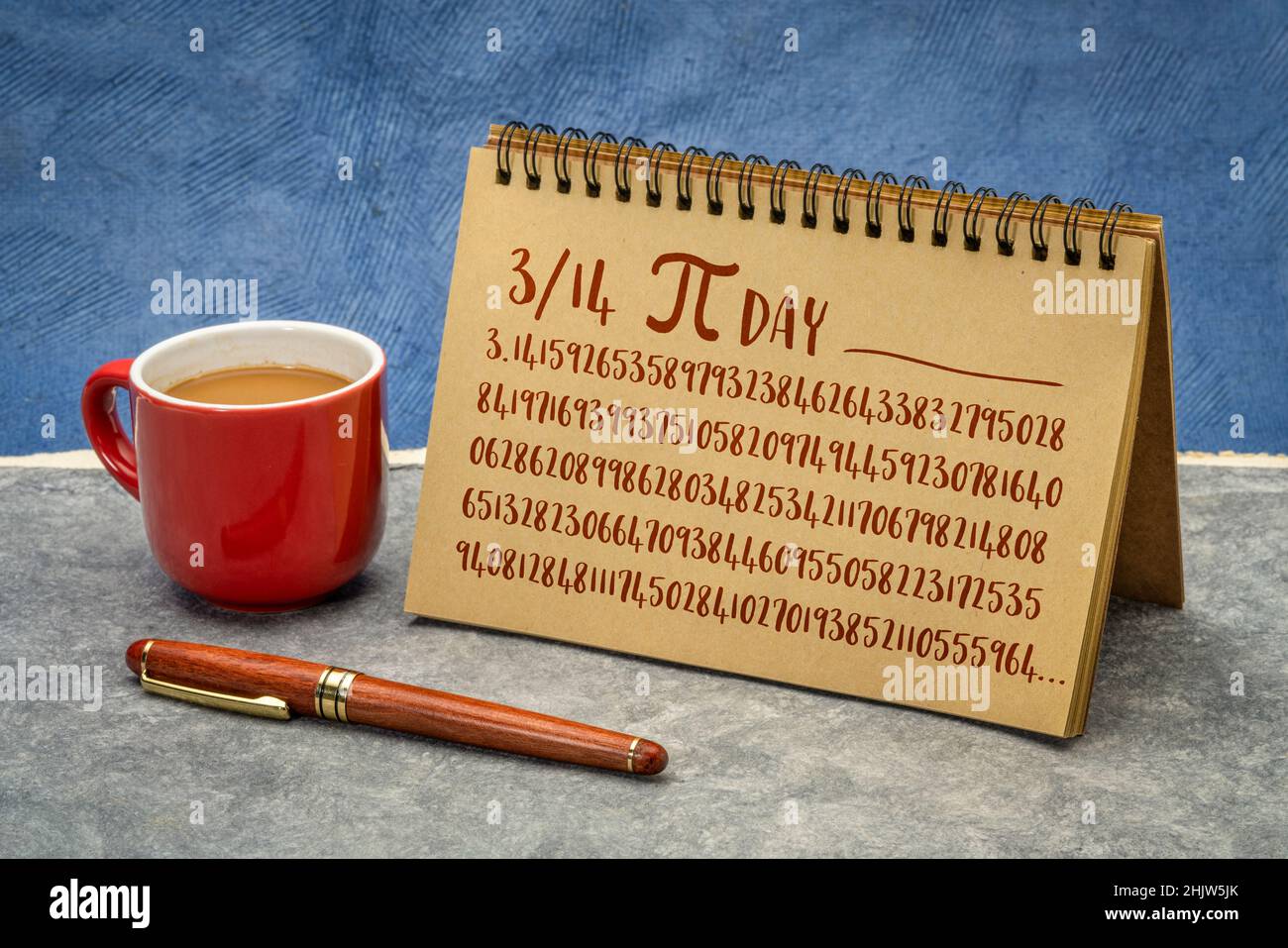 number pi 3.1415 with 140 decimal places - handwriting in a notebook, mathematics and pi day concept Stock Photo