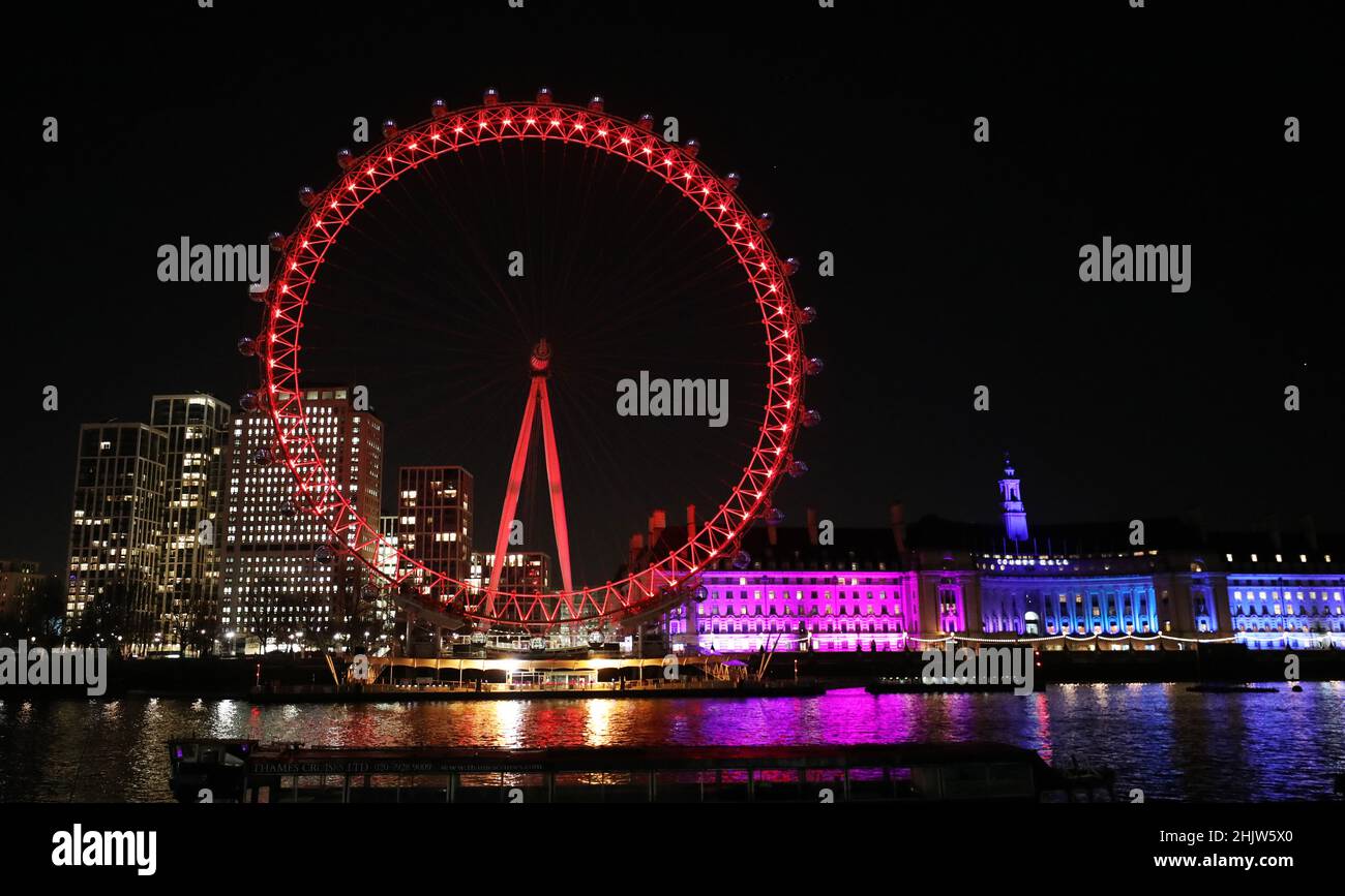 London, UK. 31st Jan, 2022. Photo taken on Jan. 31, 2022 shows the London Eye illuminated in red to celebrate the Chinese Lunar New Year in London, Britain. Credit: Li Ying/Xinhua/Alamy Live News Stock Photo