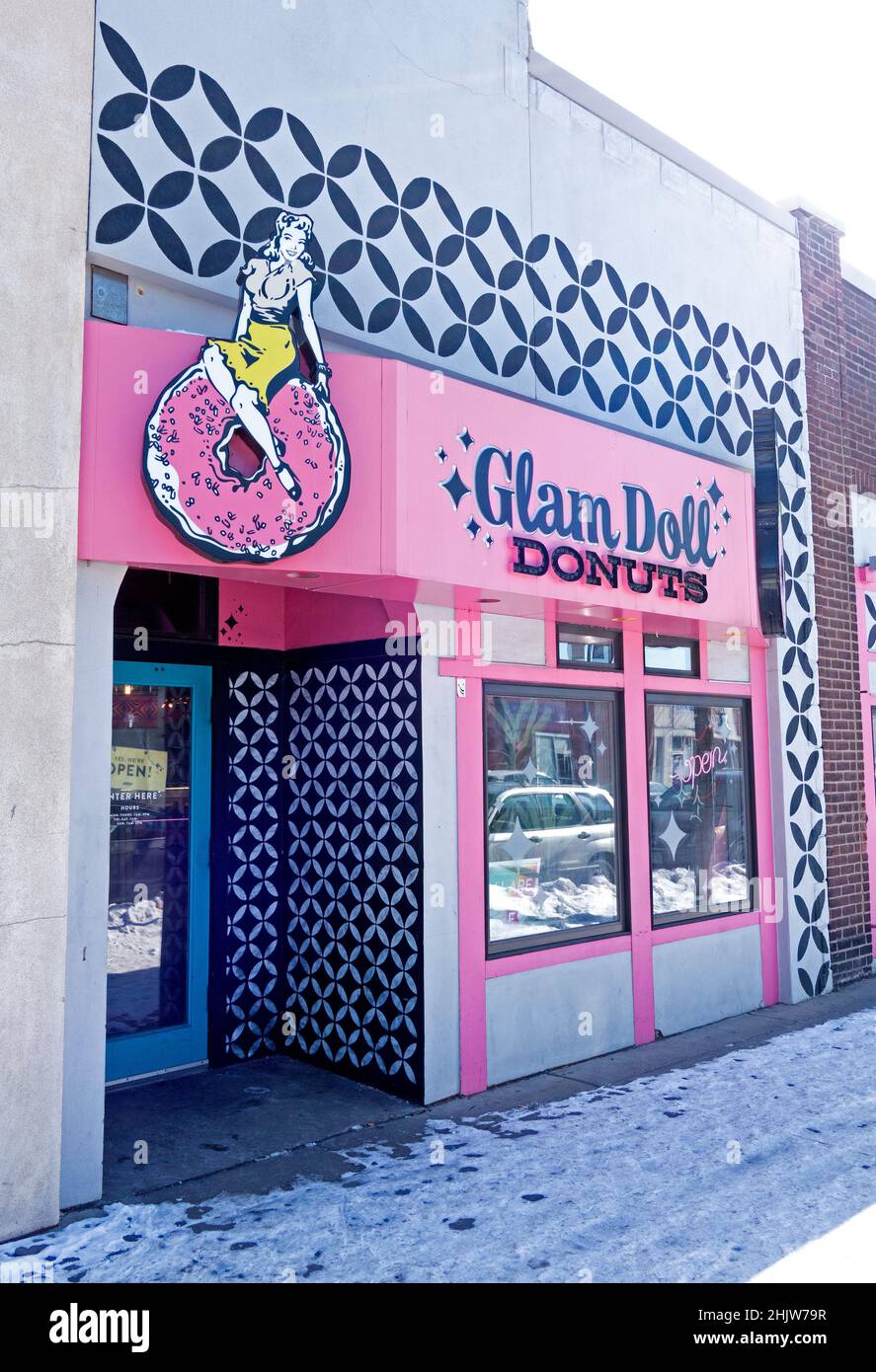 Store front of Glam Doll Donuts Shop selling very fancy imaginative donuts. Minneapolis Minnesota MN USA Stock Photo