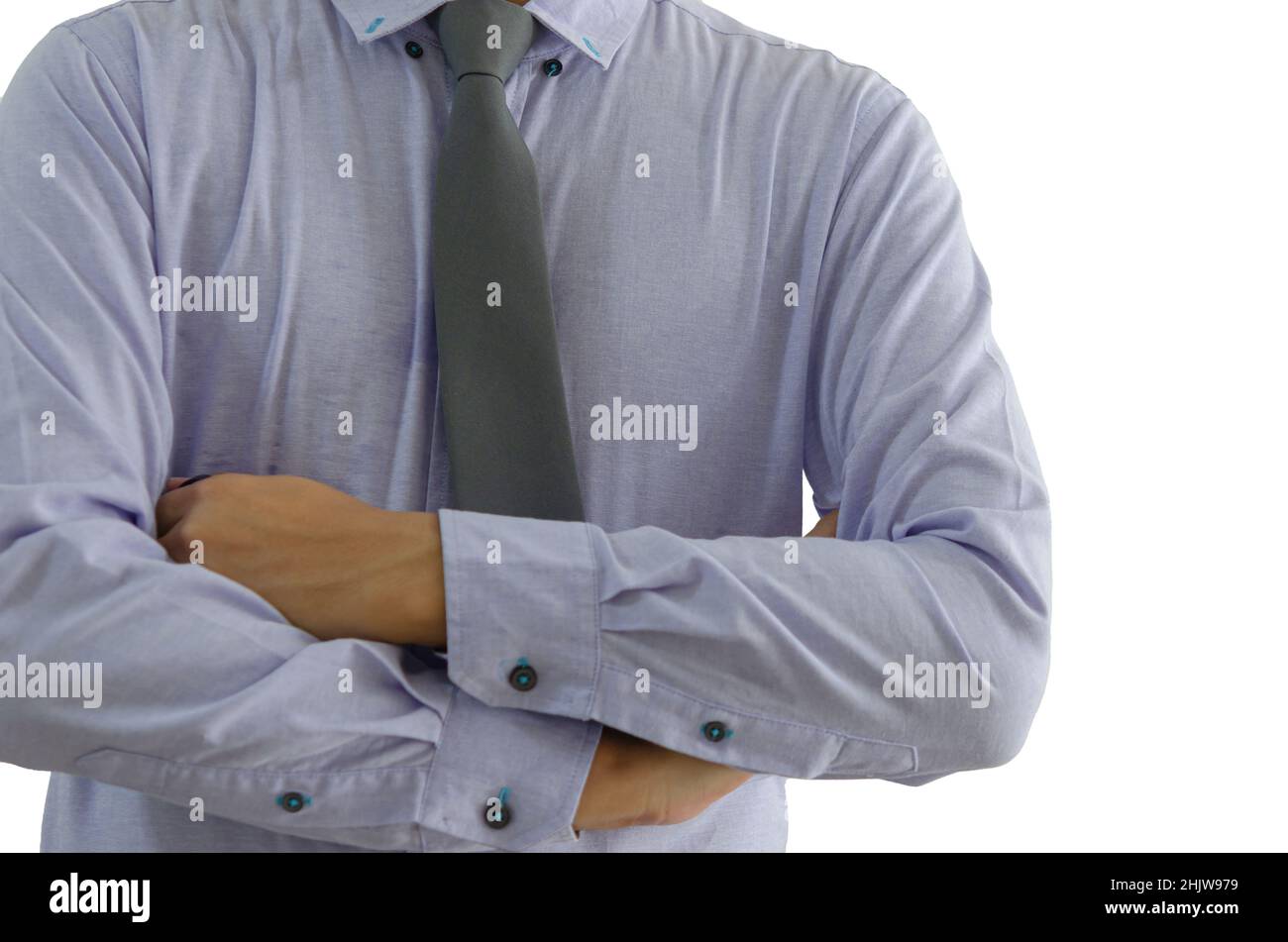Business man standing with his arms crossed on a white background. Stock Photo