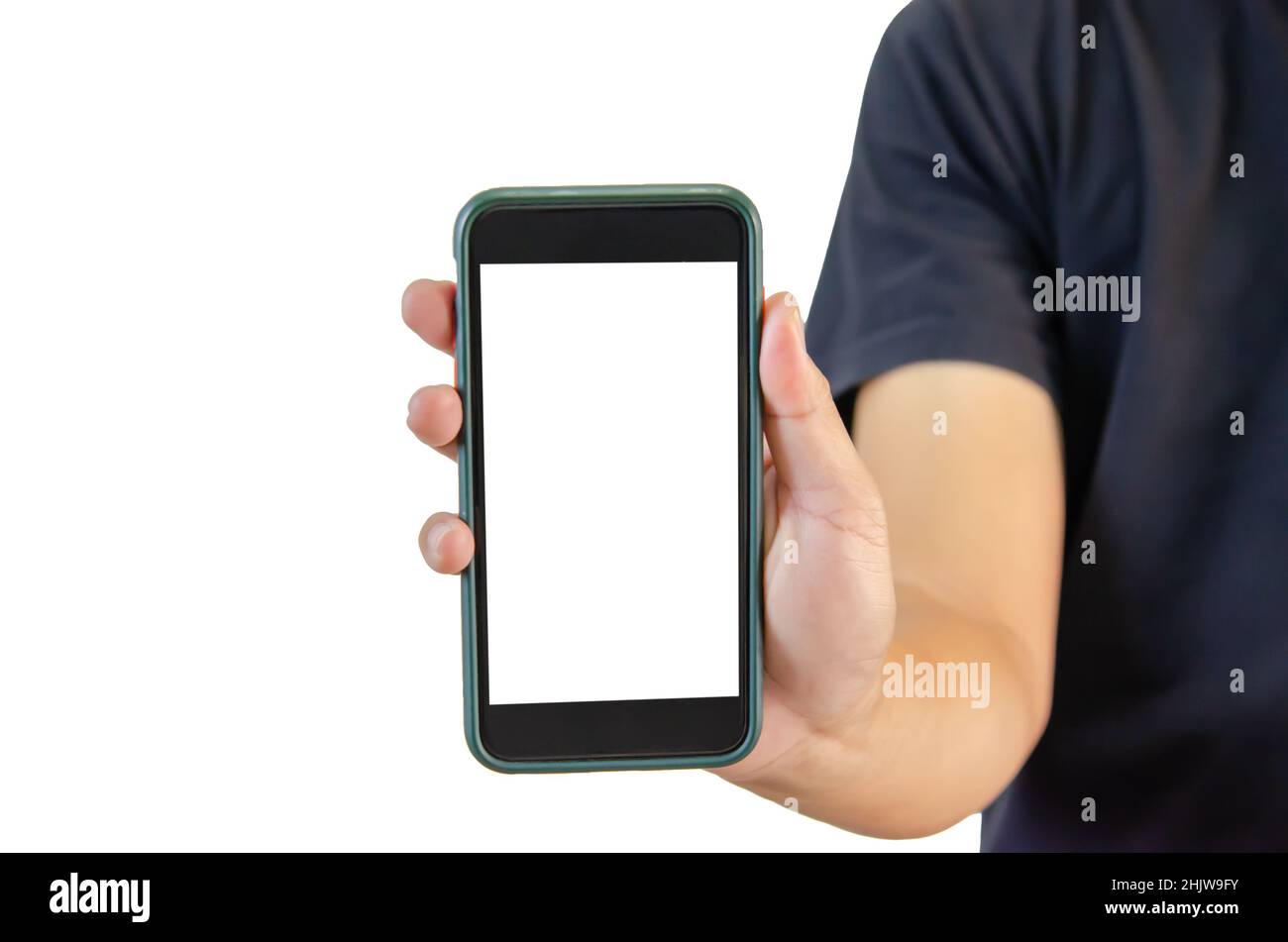 Hand holding a smartphone on a white background. White blank phone screen. Stock Photo