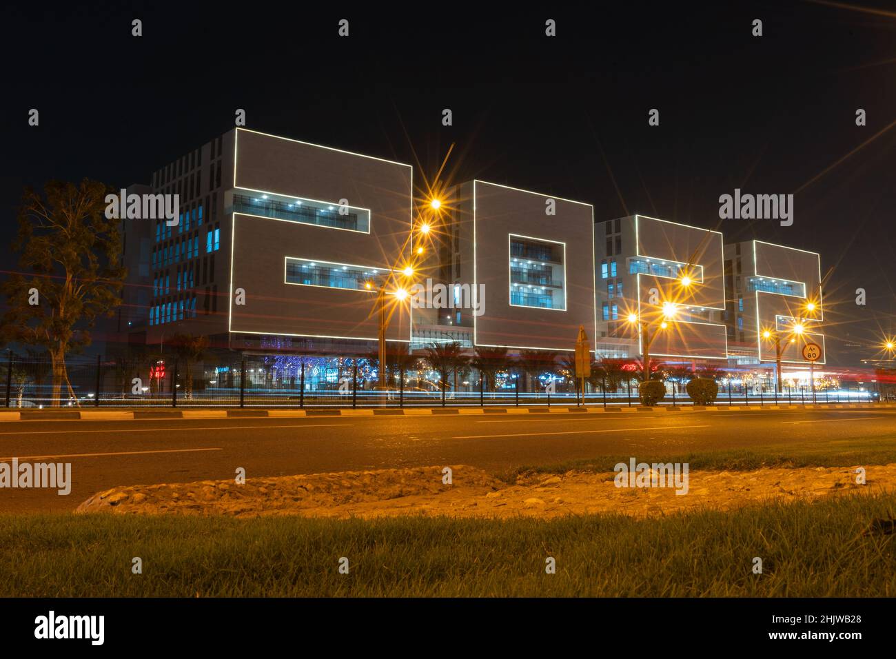 DOHA, QATAR - JANUARY 31, 2022: View of the 2022 building at night, located in the Aspire Zone in Doha, Qatar, shaped with the 2022 numbers built for Stock Photo