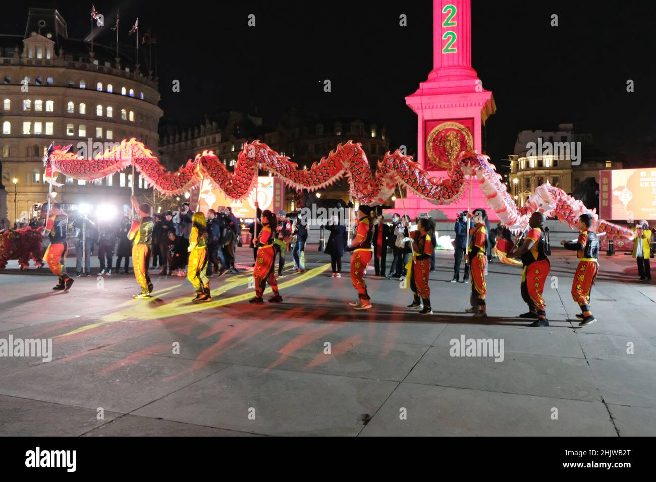 London, UK, 31st Jan, 2022. A dragon dance is performed in Trafalgar Square for Chinese New Year which falls on February 1st. The performance and ceremony was a photocall for dignataries and officials as planned public celebrations were scaled back this year. Credit: Eleventh Hour Photography/Alamy Live News Stock Photo