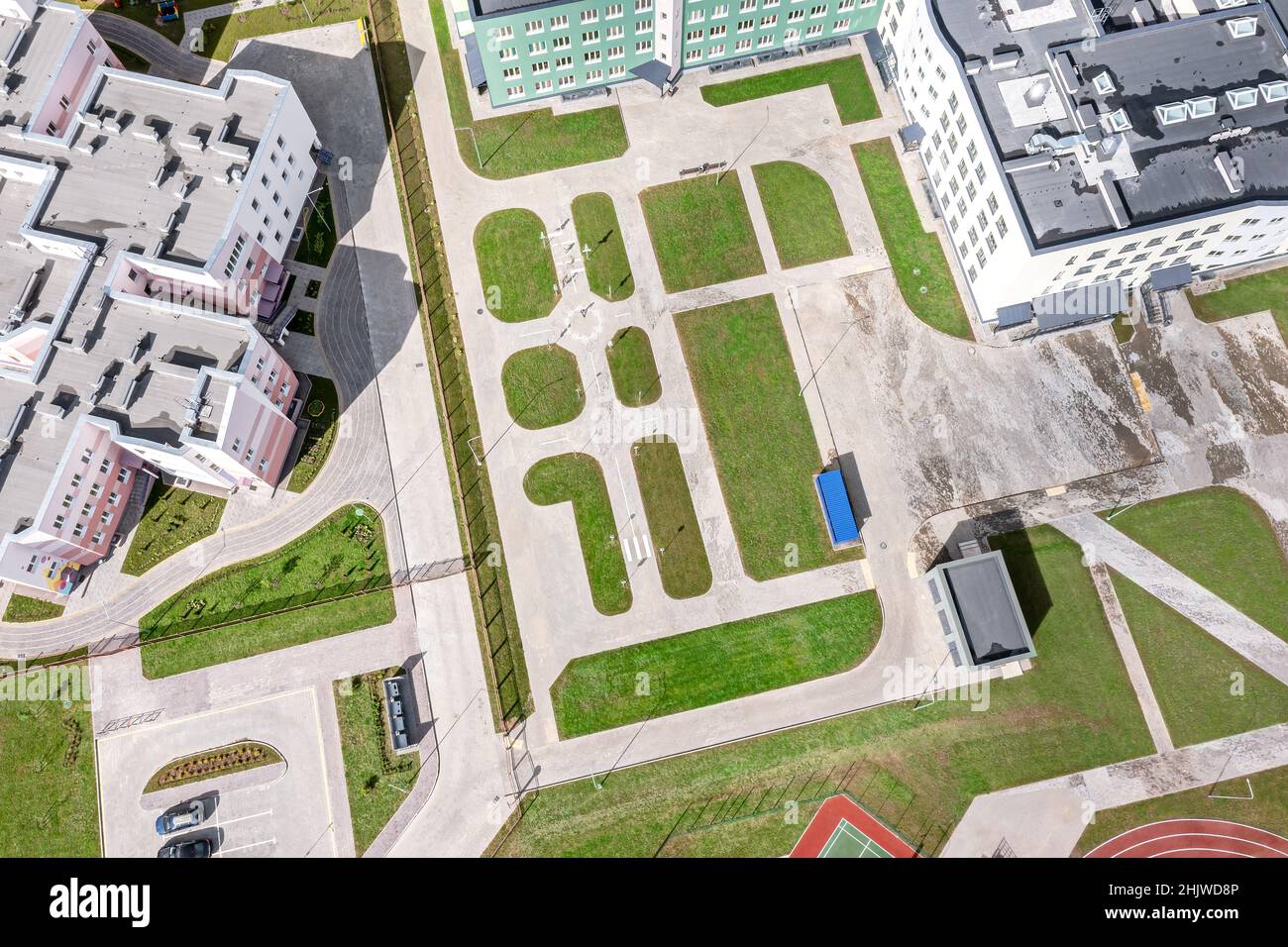 modern school complex in residential district. school courtyard with recreation area. aerial view. Stock Photo