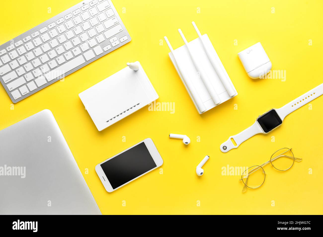 Different gadgets on color background Stock Photo