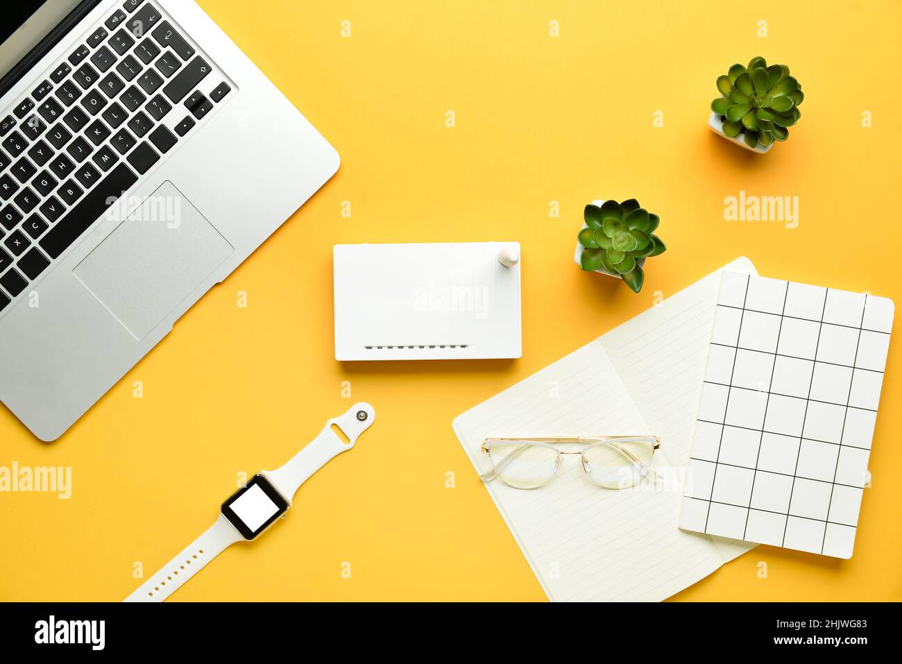 Different gadgets on color background Stock Photo