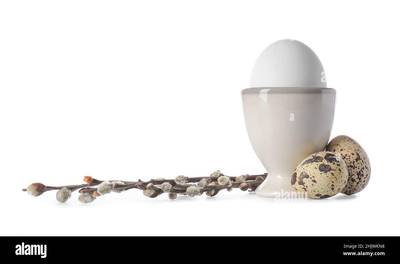 Different Easter eggs and willow branches on white background Stock ...